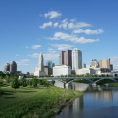 a view of a city with a bridge over a river